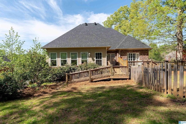7717 Clayton Cove Pkwy, Clay, AL 35126 - rear view of property with a shingled roof, fence, a deck, and a lawn