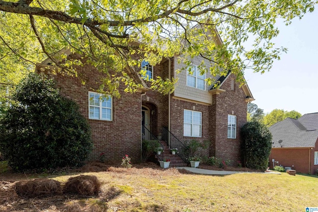 7717 Clayton Cove Pkwy, Clay, AL 35126 - view of front of home with brick siding and a front lawn
