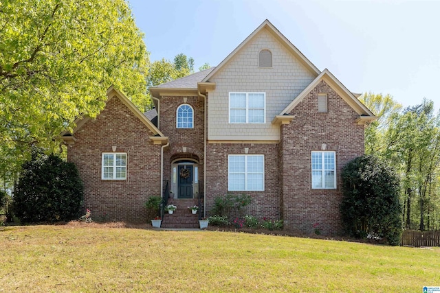 7717 Clayton Cove Pkwy, Clay, AL 35126 - traditional-style house with brick siding and a front lawn