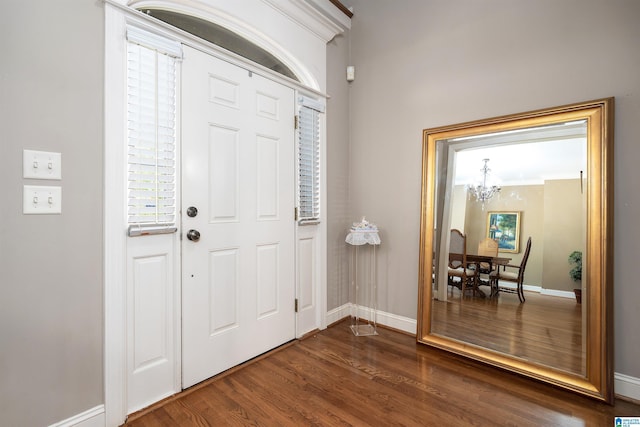 7717 Clayton Cove Pkwy, Clay, AL 35126 - foyer entrance with baseboards, an inviting chandelier, and dark wood-style floors