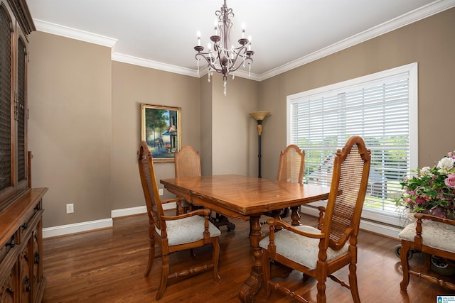 7717 Clayton Cove Pkwy, Clay, AL 35126 - dining space featuring dark wood-type flooring, baseboards, an inviting chandelier, and ornamental molding