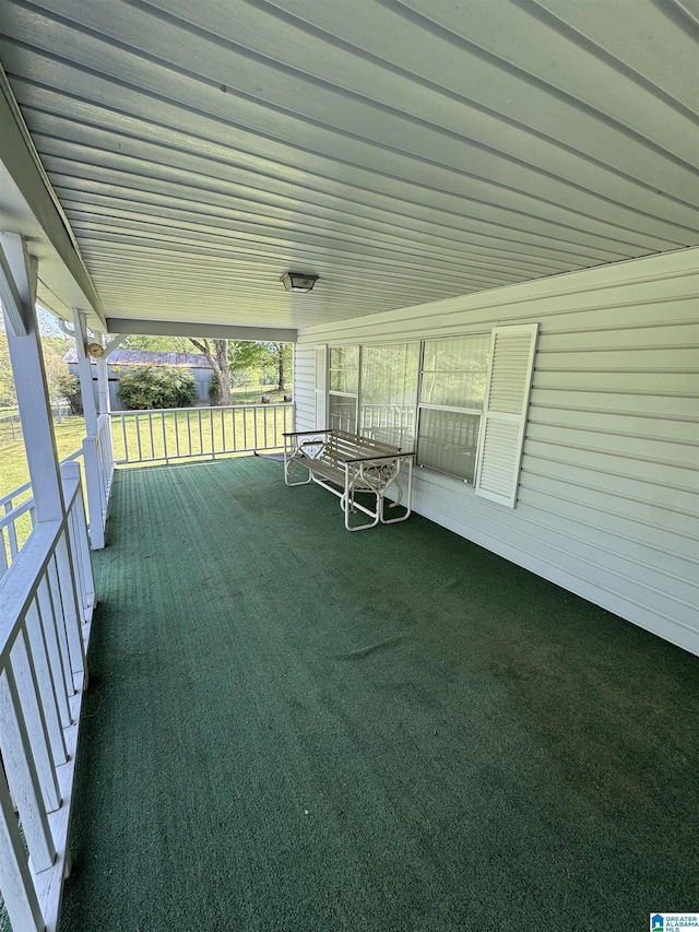 view of patio featuring a porch