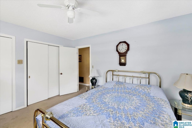 carpeted bedroom featuring a ceiling fan
