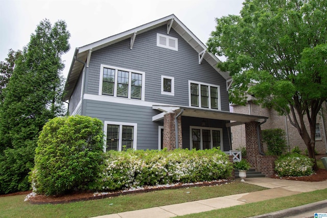3881 Ross Park Dr, Hoover, AL 35226 - view of front facade featuring brick siding and a porch