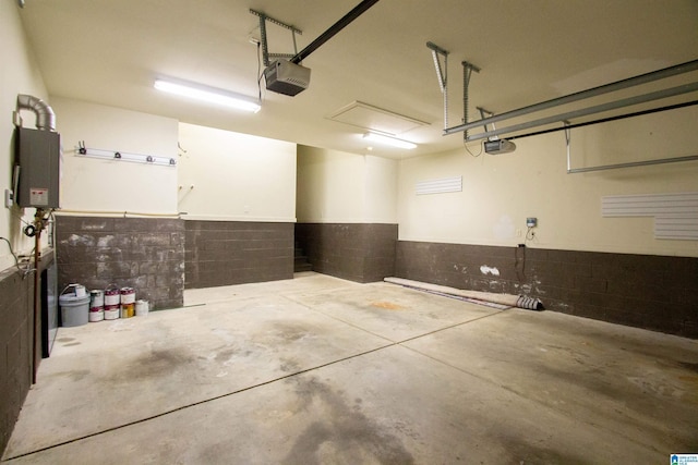 3881 Ross Park Dr, Hoover, AL 35226 - garage with a wainscoted wall and a garage door opener