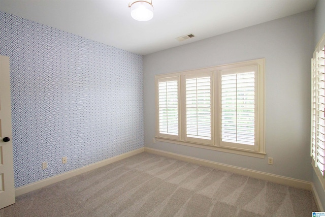 3881 Ross Park Dr, Hoover, AL 35226 - carpeted empty room with baseboards, visible vents, and wallpapered walls