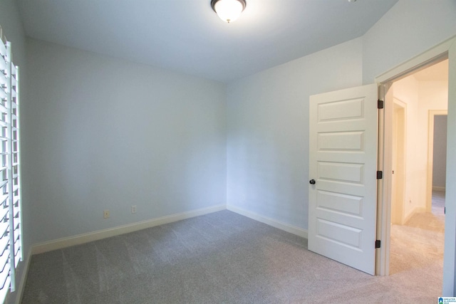 3881 Ross Park Dr, Hoover, AL 35226 - spare room featuring carpet floors and baseboards