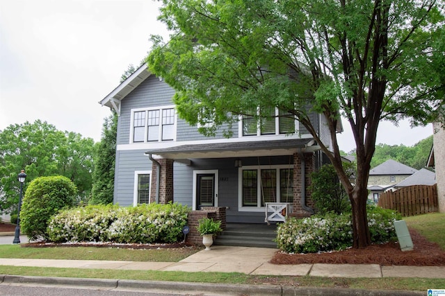 3881 Ross Park Dr, Hoover, AL 35226 - view of front of home with brick siding, fence, and covered porch