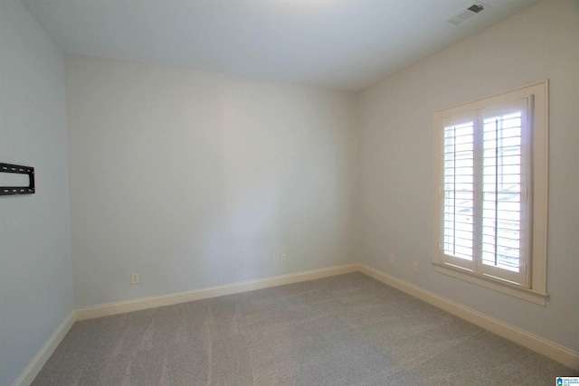 3881 Ross Park Dr, Hoover, AL 35226 - empty room with baseboards, carpet floors, visible vents, and a wealth of natural light