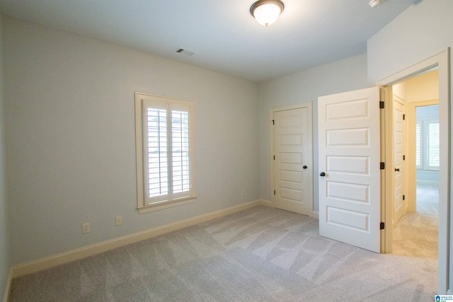 3881 Ross Park Dr, Hoover, AL 35226 - unfurnished bedroom featuring baseboards, carpet flooring, visible vents, and a closet