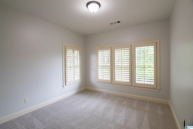 3881 Ross Park Dr, Hoover, AL 35226 - spare room featuring baseboards, carpet floors, and visible vents