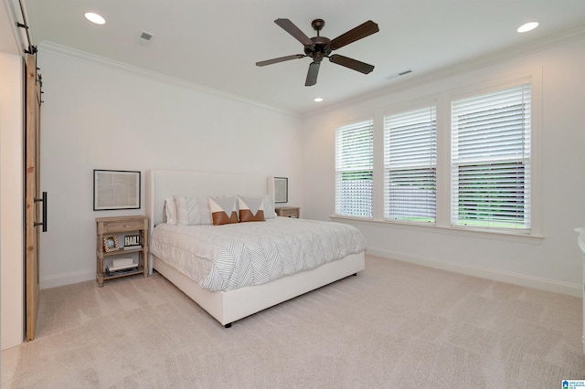 bedroom featuring visible vents, crown molding, baseboards, and light carpet
