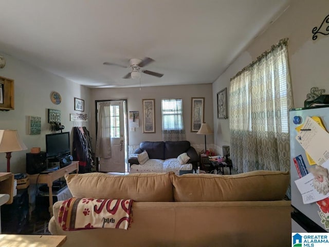 living room with a ceiling fan
