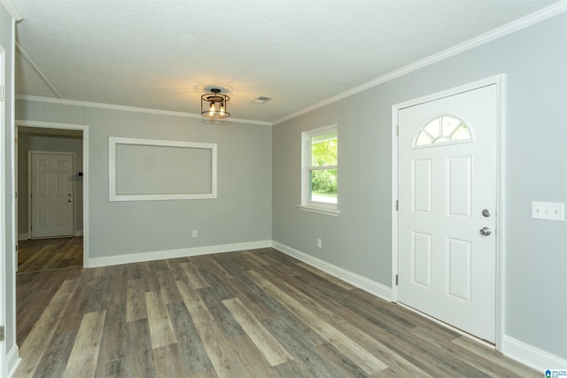 122 Mims Cir, Clanton, AL 35045 - foyer with a textured ceiling, crown molding, and wood finished floors