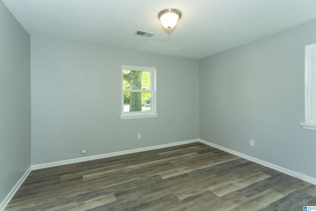122 Mims Cir, Clanton, AL 35045 - empty room with dark wood-style flooring