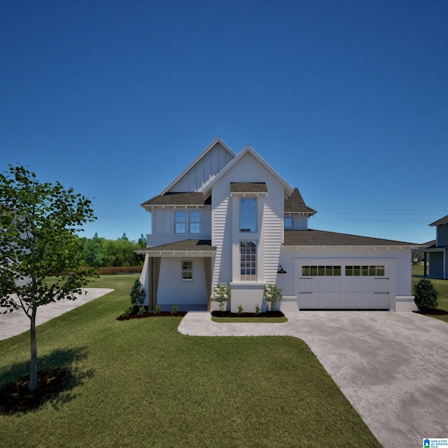 view of front facade featuring concrete driveway, an attached garage, board and batten siding, and a front lawn