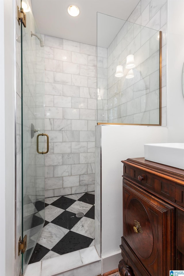 full bath with a shower stall, vanity, and recessed lighting