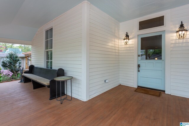 entrance to property with a porch
