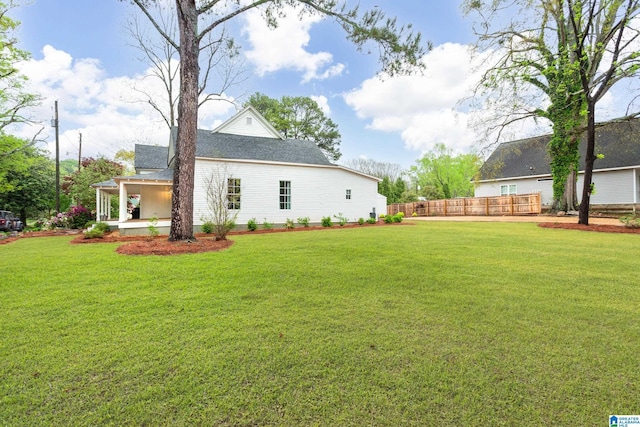 view of yard featuring fence