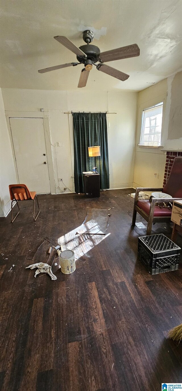 18 6th Ave S, Birmingham, AL 35205 - living room with baseboards, a ceiling fan, and wood finished floors