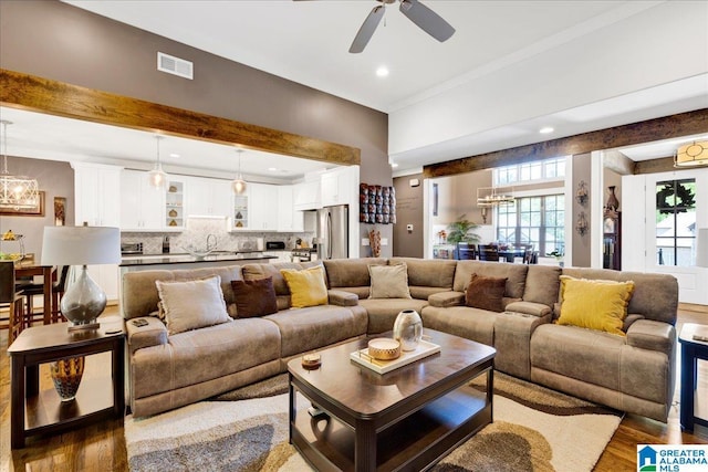 2092 Grey Oaks Ter, Pelham, AL 35124 - living room featuring wood finished floors, visible vents, and recessed lighting