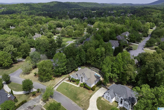 aerial view featuring a view of trees