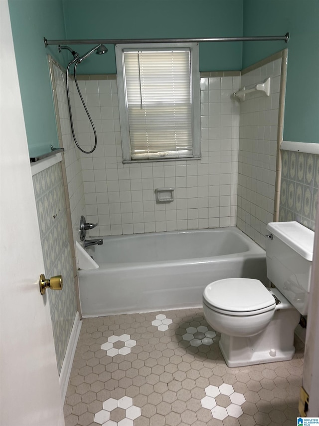 full bath featuring tub / shower combination and toilet