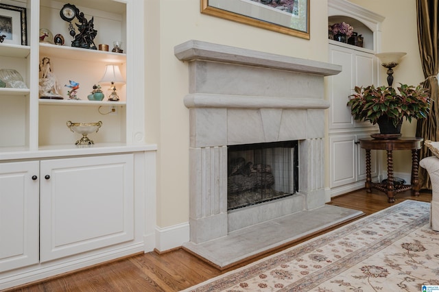 4527 High Court Cir, Hoover, AL 35242 - living room with a fireplace, wood finished floors, and built in shelves