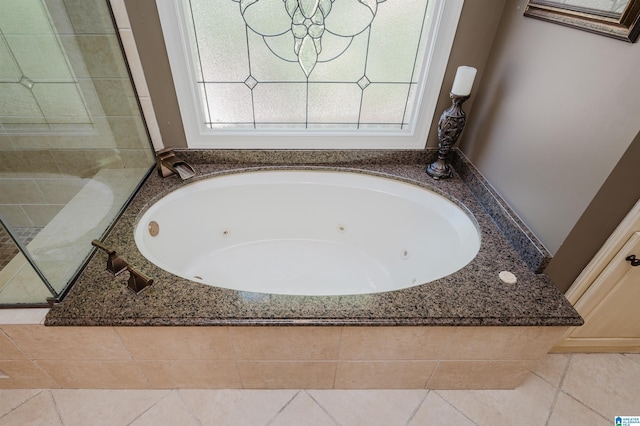 4527 High Court Cir, Hoover, AL 35242 - full bath featuring tile patterned floors and a whirlpool tub
