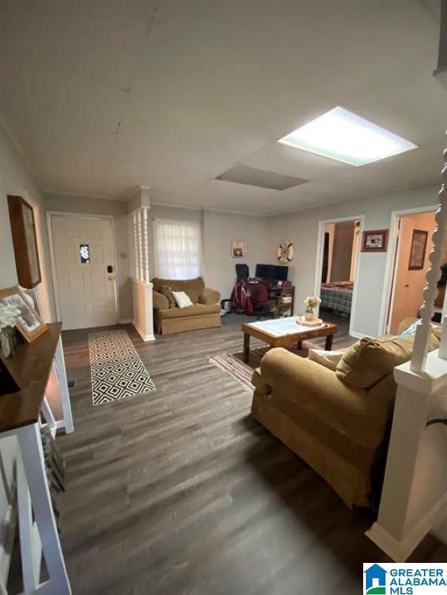 living area with wood finished floors