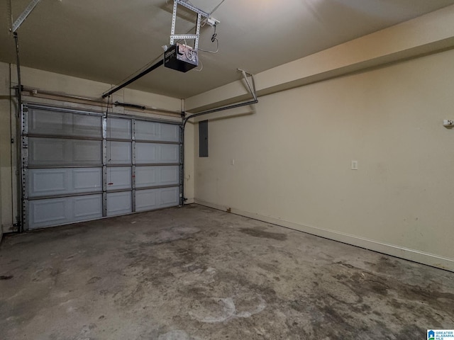 garage featuring electric panel, baseboards, and a garage door opener