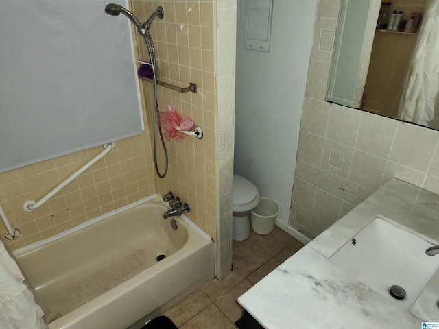 full bathroom featuring shower / bathing tub combination, tile patterned flooring, vanity, and toilet