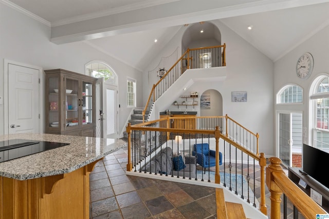 387 Misty Ln, Wedowee, AL 36278 - stairway with recessed lighting, stone finish floor, arched walkways, and high vaulted ceiling