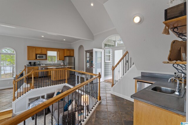 387 Misty Ln, Wedowee, AL 36278 - interior space featuring arched walkways, stone tile floors, baseboards, and recessed lighting