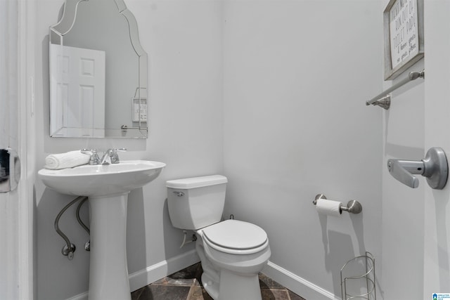 387 Misty Ln, Wedowee, AL 36278 - bathroom with baseboards, toilet, and a sink