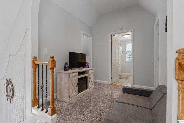 387 Misty Ln, Wedowee, AL 36278 - living area with vaulted ceiling, baseboards, and light colored carpet