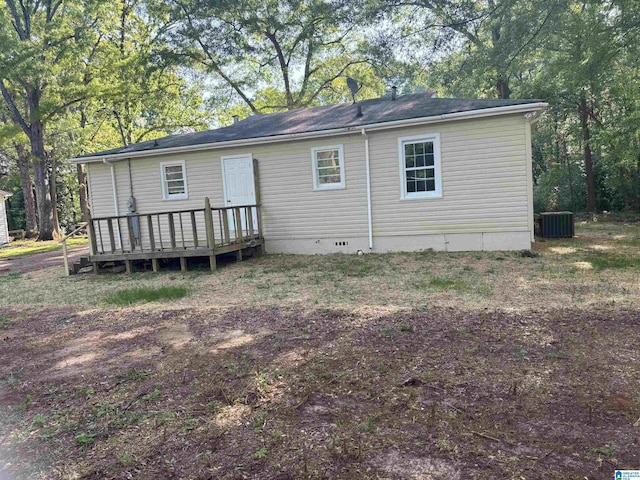 back of house with central AC, crawl space, and a deck