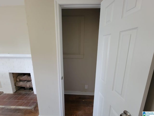 room details with baseboards and wood finished floors