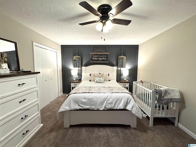 632 Bernard Couch Dr, Anniston, AL 36207 - bedroom with a textured ceiling, a ceiling fan, and dark colored carpet
