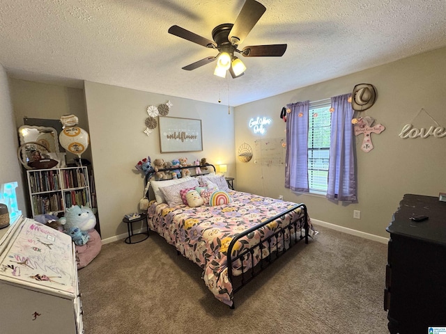 632 Bernard Couch Dr, Anniston, AL 36207 - bedroom with a textured ceiling, carpet flooring, ceiling fan, and baseboards