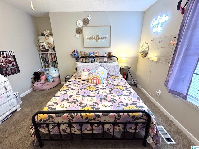 632 Bernard Couch Dr, Anniston, AL 36207 - carpeted bedroom with visible vents and baseboards