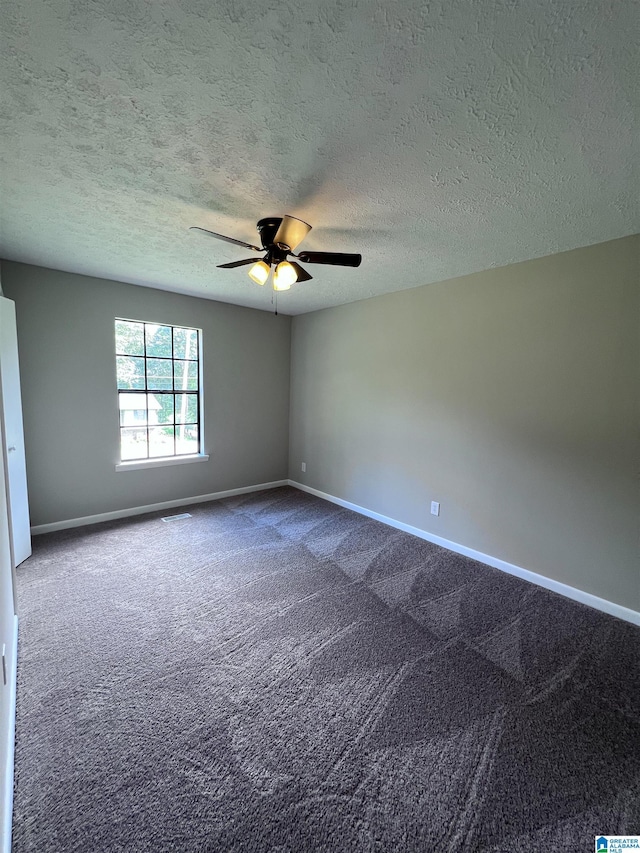 632 Bernard Couch Dr, Anniston, AL 36207 - carpeted empty room with a textured ceiling, a ceiling fan, and baseboards