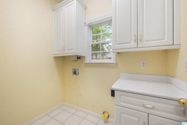 43 Dogwood Dr, Calera, AL 35040 - clothes washing area with baseboards, hookup for a washing machine, cabinet space, and light tile patterned floors