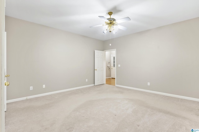 43 Dogwood Dr, Calera, AL 35040 - unfurnished room with a ceiling fan, baseboards, and light colored carpet