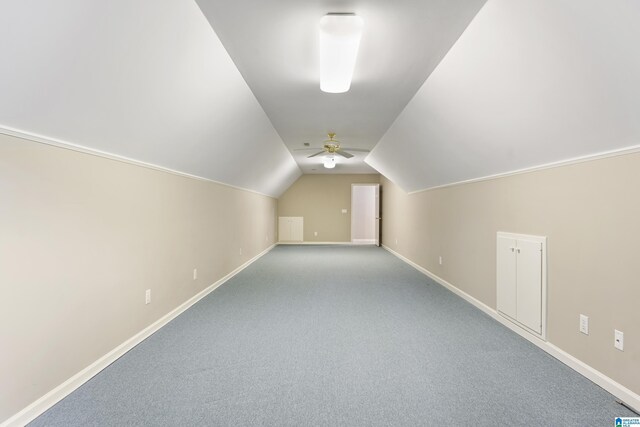 43 Dogwood Dr, Calera, AL 35040 - additional living space with carpet flooring, baseboards, vaulted ceiling, and ceiling fan