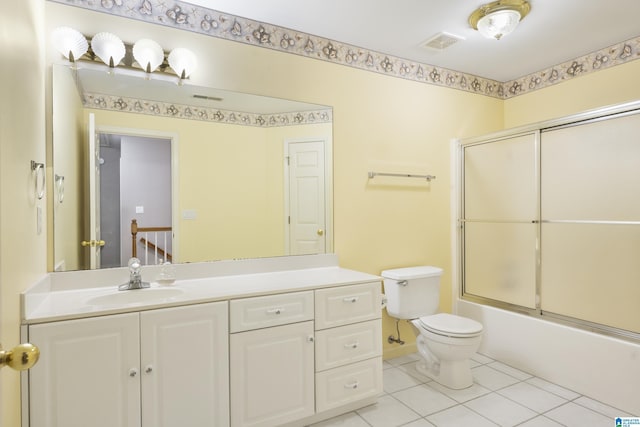 43 Dogwood Dr, Calera, AL 35040 - full bathroom with toilet, visible vents, tile patterned flooring, and vanity