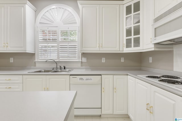 43 Dogwood Dr, Calera, AL 35040 - kitchen with a sink, light countertops, white cabinets, glass insert cabinets, and white appliances