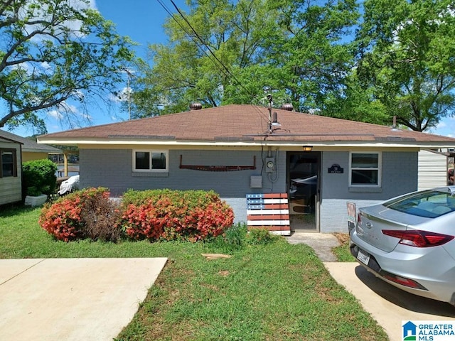 view of front of home with brick siding and entry steps