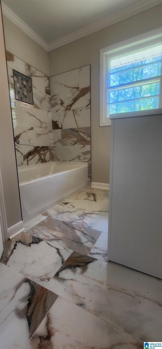 bathroom featuring shower / tub combination and ornamental molding
