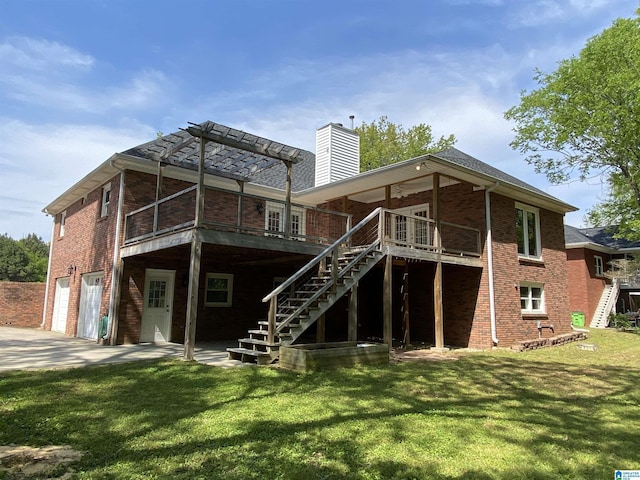 rear view of house featuring brick siding, driveway, stairs, and a garage